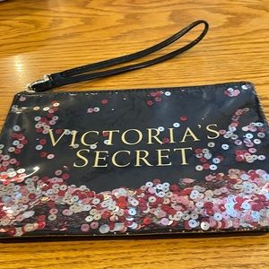 Victoria’s Secret wristlet, sequined front, plain black back, 6”x9”